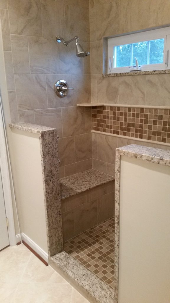 brown speckled granite shower