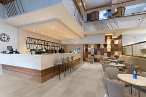 Interior of a spacious cafe bar in hotel lobby
