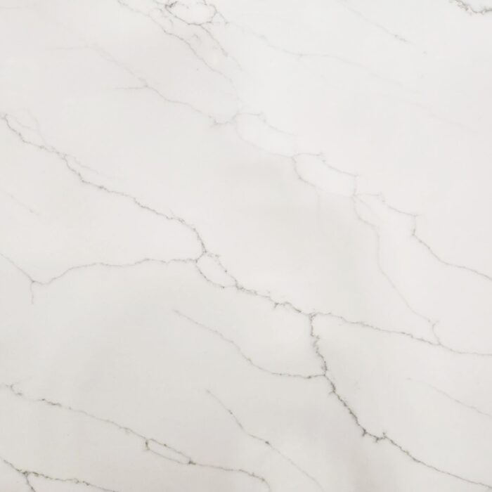 White marble slab with light gray veining and subtle texture throughout.