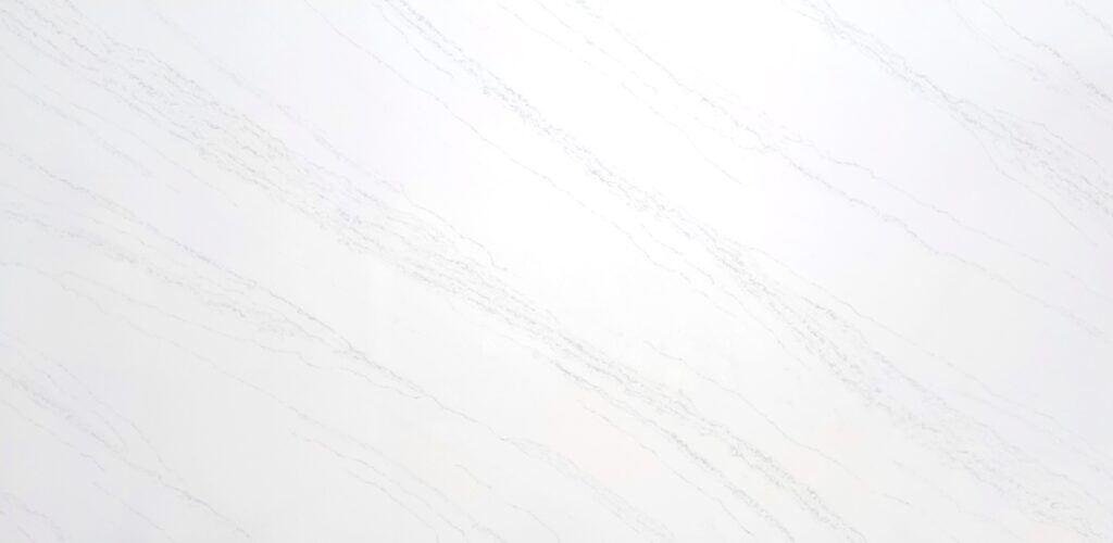 White marble background with subtle gray veins running diagonally across the surface